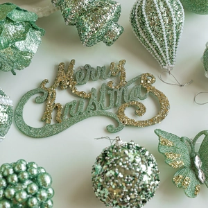 Mint green Christmas ornaments set with glitter ball, butterfly, and Merry Christmas sign