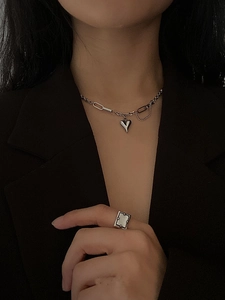 925 silver heart pendant necklace and minimalist ring set shown on fashion model