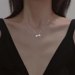 Elegant dragonfly pendant necklace with sparkling crystals on a silver chain for women