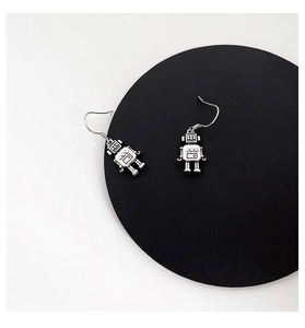 Detailed view of silver robot ear hooks with retro metallic finish and intricate texture