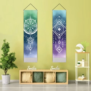 Vertical artistic tapestries with geometric lunar eclipse designs in a modern living room
