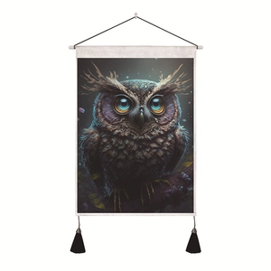 Macro detail of vertical owl wall tapestry with decorative black tassels and white bar
