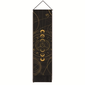 Detail view of astronomical moon phase tapestry with gold celestial patterns and black fringe