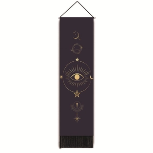 Detail of deep purple wall tapestry featuring golden mystical symbols and black tassels
