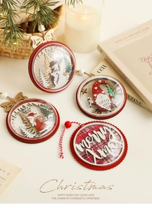 Detail of wooden Christmas ornaments with Santa motifs and acrylic domes in warm decor