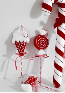 Détails de décorations de Noël en velours rouge et blanc avec paillettes et rubans nœuds