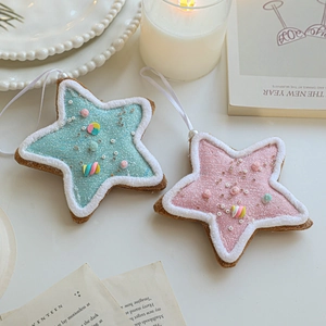 Pink and blue foam star Christmas tree ornaments with glitter and white faux fur trim