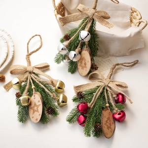 Christmas tree ornaments set with pine needles, cones, wood slices and metal bells