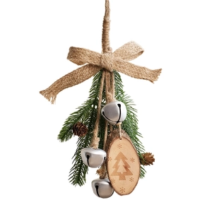 Christmas decoration with pine cones, silver bells, wood slice and burlap bow on white background