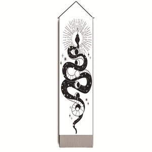 Close-up of long black and white snake tapestry with moon phase and star pattern details