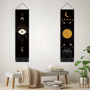 Bohemian tapestry set featuring celestial sun and moon astrology designs with black tassels