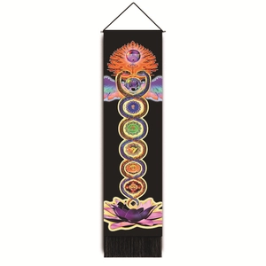 Detailed view of black chakra wall hanging with seven colorful symbols and fringe