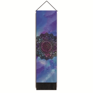 Detail of bohemian mandala wall hanging with purple watercolor print and black tassels