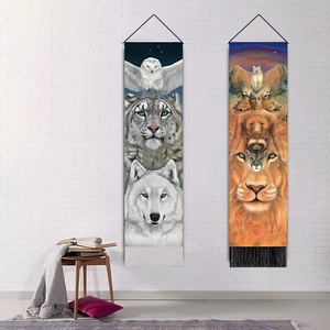 Hanging wall tapestries with forest animal totems and tassels in a cozy living room
