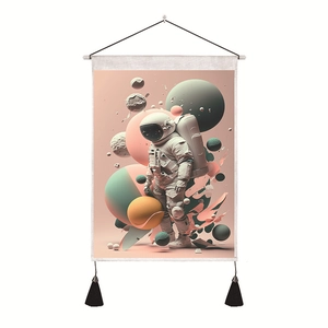 Detail of astronaut tapestry with pink and green planets and decorative tassels