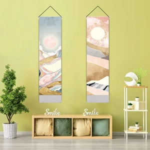 Detail of Nordic mountain landscape tapestry with red sun and elegant wooden scroll bars