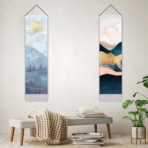 Nordic landscape wall tapestries featuring sun and mountain designs in a modern room
