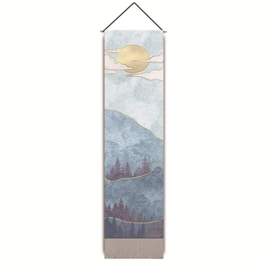 Detail of Nordic wall tapestry featuring golden sun and blue mountains landscapes