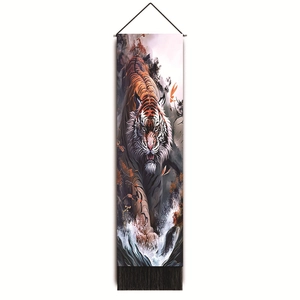 Close-up of the high-quality fabric texture and black tassel detail on the tiger wall scroll