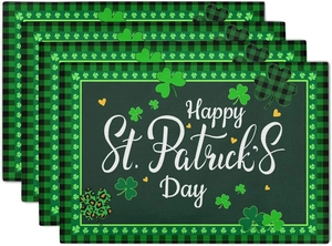 Detail of St. Patrick's Day placemats with buffalo plaid borders and linen texture