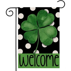 Saint Patrick's Day garden flag with green clover and welcome text on a black stand