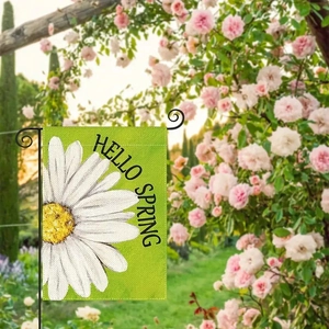 Detailansicht der Gartenflagge aus Leinen mit weißem Gänseblümchen und Frühlingsgruß
