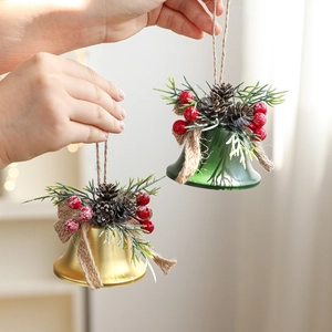 Christmas iron bells with pine cones and berries hanging decorations for holiday trees