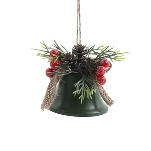 Classic green metal Christmas bell hanging ornament with pine needles and red berries