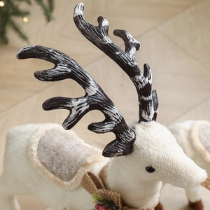 White plush Christmas reindeer figurine with rustic bow and pine cone berry accent