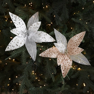 Sparkling 26cm artificial poinsettia flowers in silver and champagne gold on a Christmas tree