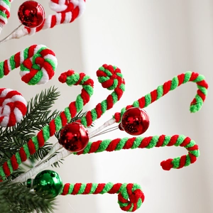 Christmas tree pick with plush red white and green spiral candy canes and glossy ornaments
