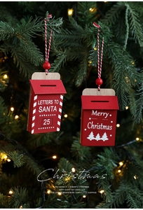 Macro view of red wooden mailbox ornaments with Santa letters and Merry Christmas prints