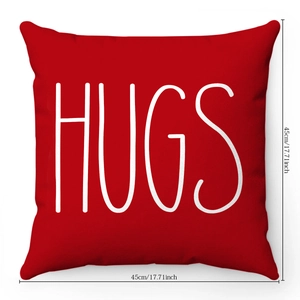 Detail of red plush pillow case showing HUGS print and 45x45cm dimension measurements