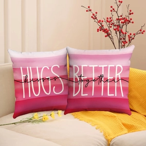 Pink gradient decorative pillow cases with HUGS kisses BETTER together slogan set of 2