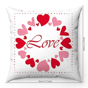 Detail of soft plush pillowcase featuring Love text and red heart wreath print
