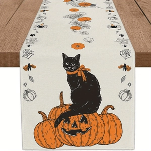 Halloween table runner with black cat and pumpkin prints on beige linen fabric