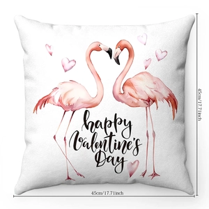Detail view of flamingo heart print and Happy Valentine's Day text on 45cm plush pillow cover