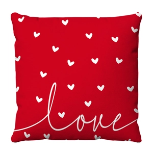 Red plush Valentine's Day throw pillow with white heart patterns and Love script print