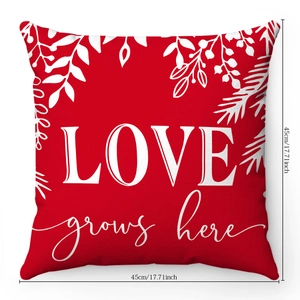 Detail of red plush pillow case with LOVE grows here print and 45x45cm dimensions