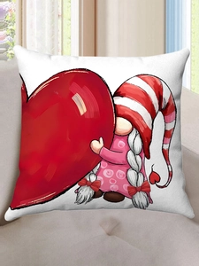Detail of white plush pillow cover featuring a cute Valentine gnome holding a red heart