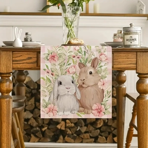 Détail de l'imprimé lapin réaliste et motif à carreaux roses sur chemin de table