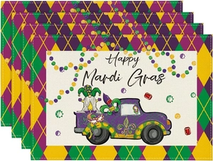 Close-up of four linen Mardi Gras placemats with vintage truck and gnome digital print