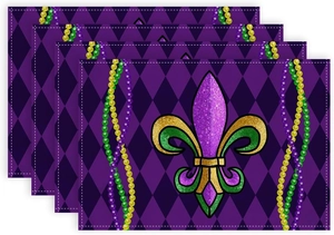 Set of four Mardi Gras placemats featuring a fleur-de-lis design in festive purple and gold
