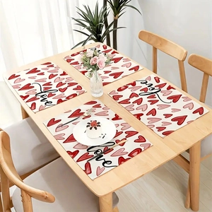 Set of four beige table mats with red hearts and Love script for Valentines decor