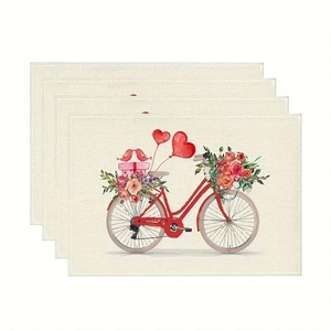 Detailed close-up of set of 4 linen placemats with watercolor bicycle and heart motifs