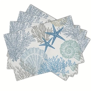 Detailed view of linen place mats with ocean starfish, coral and seashell patterns