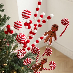 Piques de bonhomme pain d'épice et sucettes en peluche pour déco de Noël