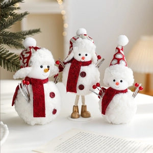 Three plush Christmas snowman figurines with red scarves and hats for festive decor