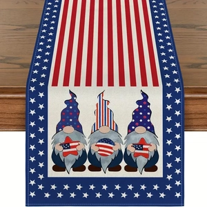Detail of linen table runner with patriotic gnomes and red white blue American flag motifs
