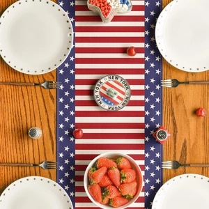 Detailed top view of Independence Day linen table runner with red white blue flag patterns